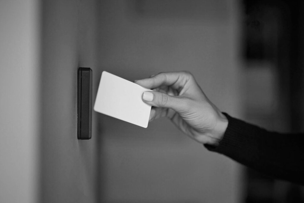 Close up,Of,A,Female,Hand,Holding,A,Card,For,Door