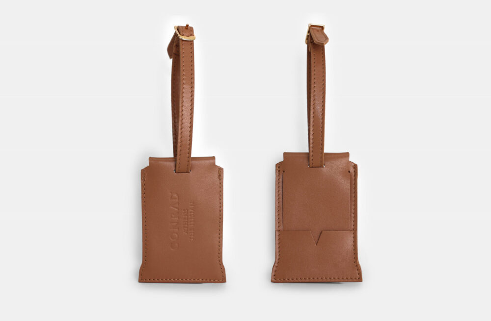 conrad luggage tag